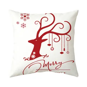 Christmas deer snowflake pillow cover detail shot showing festive red holiday design.