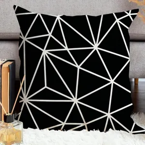 Black and white geometric cushion cover, abstract pattern design for modern sofa decor.