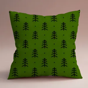 Gros plan détaillé de la texture de la taie d'oreiller verte au motif de pin.