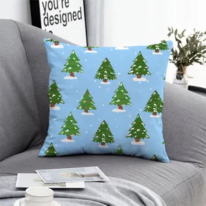 Blue Christmas tree pattern pillow cover detail, cozy sofa scene display, soft festive home decor.