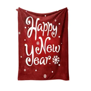 Manta de forro polar roja de felpa con texto Feliz Año Nuevo y copos para uso hogareño.
