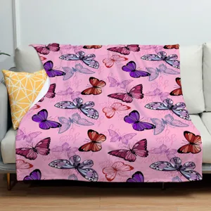 Pink flannel blanket featuring colorful butterfly patterns and cozy design for bedroom use.