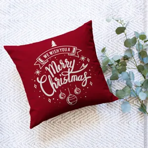 Christmas pillowcase detail view, red festive cushion cover with white holiday typography.
