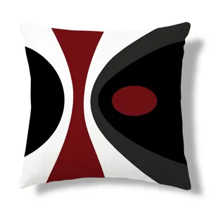 Detail van de kussenhoes met geometrisch patroon en strakke stofafwerking voor interieur.