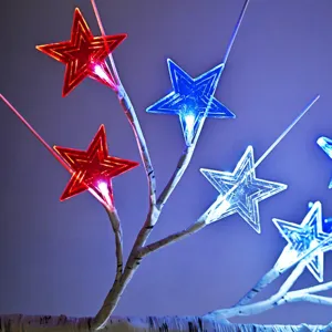 Detailed view of 4th of July LED star branch lights with red, white and blue glowing stars.