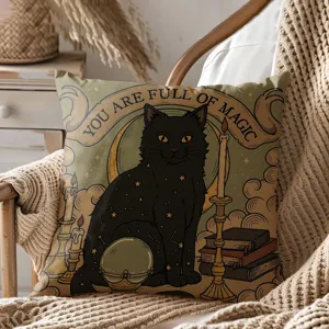 Vintage black cat decorative throw pillow detail showing magical occult illustration and cozy texture.
