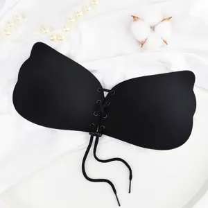 Detail view of the black invisible strapless bra with a drawstring front design for gowns.