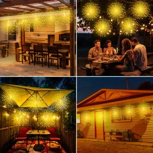 Outdoor hanging starburst firework string lights illuminating a warm patio and garden setting.