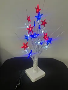 Detail view of the red white and blue star LED birch tree branch light for patriotic decor.