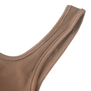 Brown ribbed tank top strap detail, soft knit fabric, casual women's apparel close-up.