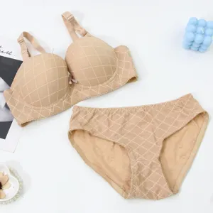 Detailed shot of beige plaid bra and panties set, showcasing comfortable fabric and bow.