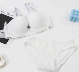 White push-up bra and panty set for women, comfortable breathable grid textured lingerie.