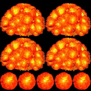 Solar LED marigold flower string lights, glowing floral decorative lights for Halloween decor.