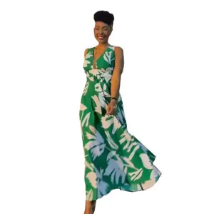 Women's green floral sleeveless V-neck waist-cinching swing maxi dress for summer fashion.