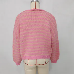 Detail view of the pink and beige striped knit cardigan showing back texture and design.