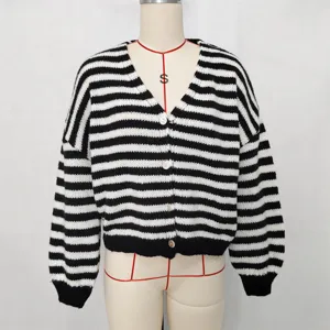 Black and white striped V-neck knit cardigan detail view, long sleeve casual sweater.