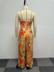 Back view detail of women's orange floral strapless wide leg jumpsuit, comfy and stylish.
