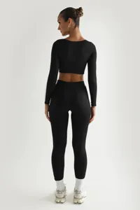 Γυναικείο σετ γιόγκα με ριμπ crop top μακρυμάνικο και στενό κολάν μονόχρωμο αθλητικό.