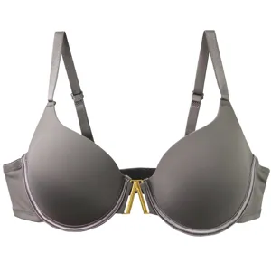 Close-up view of the seamless underwire bra featuring a chic gold tone center V hardware detail.