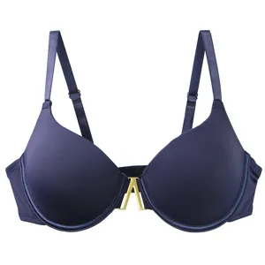 Detail view of a solid navy blue underwire seamless push-up bra with central gold V hardware.