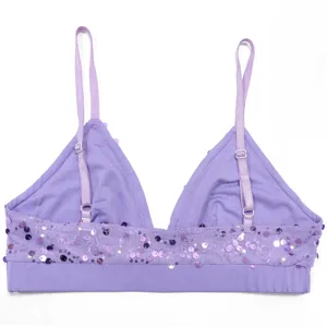 Detail view of a stunning purple sequin bralette top featuring adjustable thin straps.