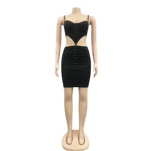 Sexy black cutout bodycon dress detail view, featuring adjustable straps and stylish metal ring waist lacing.