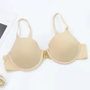 Comfortable solid color seamless push-up bra with underwire and stylish metal front buckle.