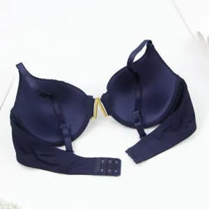 Dark blue seamless push-up bra with underwire, adjustable straps and chic metal front detail.