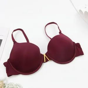 Sexy underwire push-up solid color seamless bra with stylish front metal buckle detail.