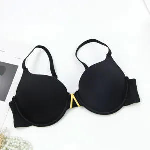 Black seamless underwire thin molded cup bra detail showing gold V metal front clasp.