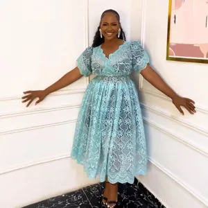 Light blue lace hollow V-neck midi dress detail, short puff sleeves elegant style.