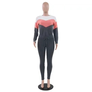 Colorblock knitwear set featuring a contrast long-sleeve sweater and drawstring pants.