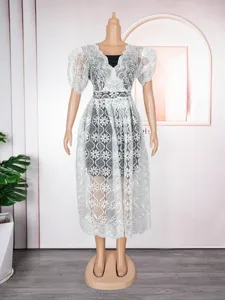 White lace hollow V-neck dress detail, elegant bubble sleeve design, women fashion apparel.