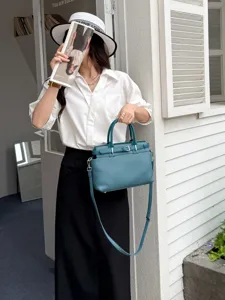 Stylish leather Kelly tote bag for women, large capacity crossbody handbag with top handle.