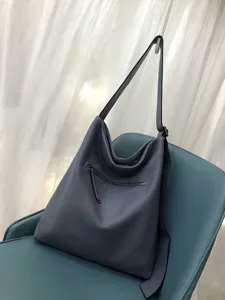 Soft leather hobo shoulder bag with slouchy design, casual crossbody purse for daily wear.