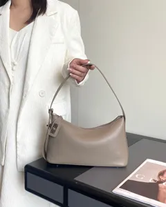 Elegant genuine leather underarm bag for women, chic french style shoulder pillow bag.