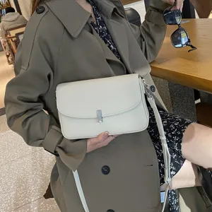 Genuine leather women shoulder bag, stylish casual crossbody purse with elegant metal clasp.