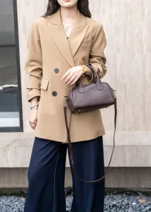 Genuine leather Boston handbag for women, classic dark brown shoulder and crossbody bag detail.