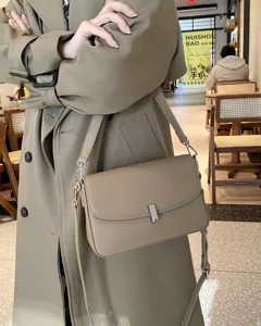 Genuine leather shoulder bag for women, stylish minimalist flap crossbody bag with metal lock.