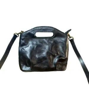 Retro genuine leather crossbody handbag for women, vintage commuter top handle shoulder bag.