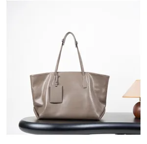 Taupe leather tote bag for women, large capacity relaxed commuter shoulder bag with tag.