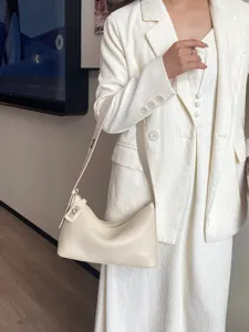 Elegant genuine leather shoulder bag for women, stylish underarm hobo pillow bag.