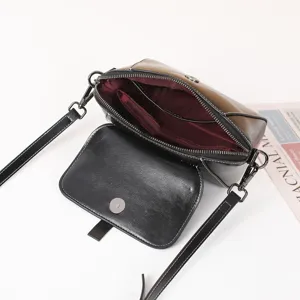 Detailed view of the women vintage oil wax leather crossbody bag, showing the interior.