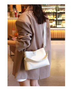 Stylish white leather crossbody shoulder bag for women, elegant daily handbag with gold hardware.