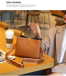 Stylish brown leather shoulder bag for women, elegant daily handbag with wide strap and chic metal lock.