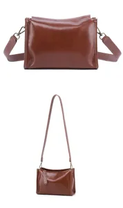 Classic brown genuine leather crossbody shoulder bag for women, retro style pillow bag design.