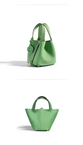 Green genuine leather bucket handbag detail view showing premium top layer cowhide design.