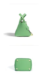 Green top layer cowhide bucket bag classic leather handbag with lock and cute smiley charm.