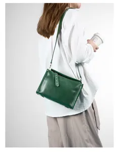Vintage green genuine leather crossbody bag, stylish vegetable-tanned shoulder bag for women.