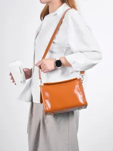 Genuine leather retro pillow shoulder bag for women, brown vegetable-tanned cowhide.